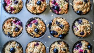 homemade muffins in muffin tin out of oven