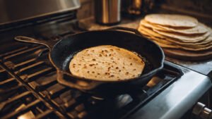 12_inch_cast_iron_skillet_on_the_stove_over.jpeg