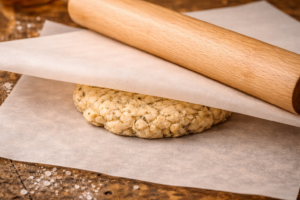 Rolling out sourdough cracker dough