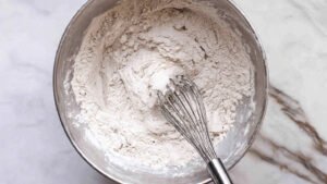 whisking together the dry ingredients in a bowl